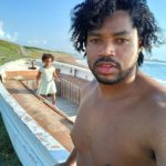 World's first quadrillionaire Kimroy KB Bailey and his baby Keilah Trott Bailey on their Fishing Boat.