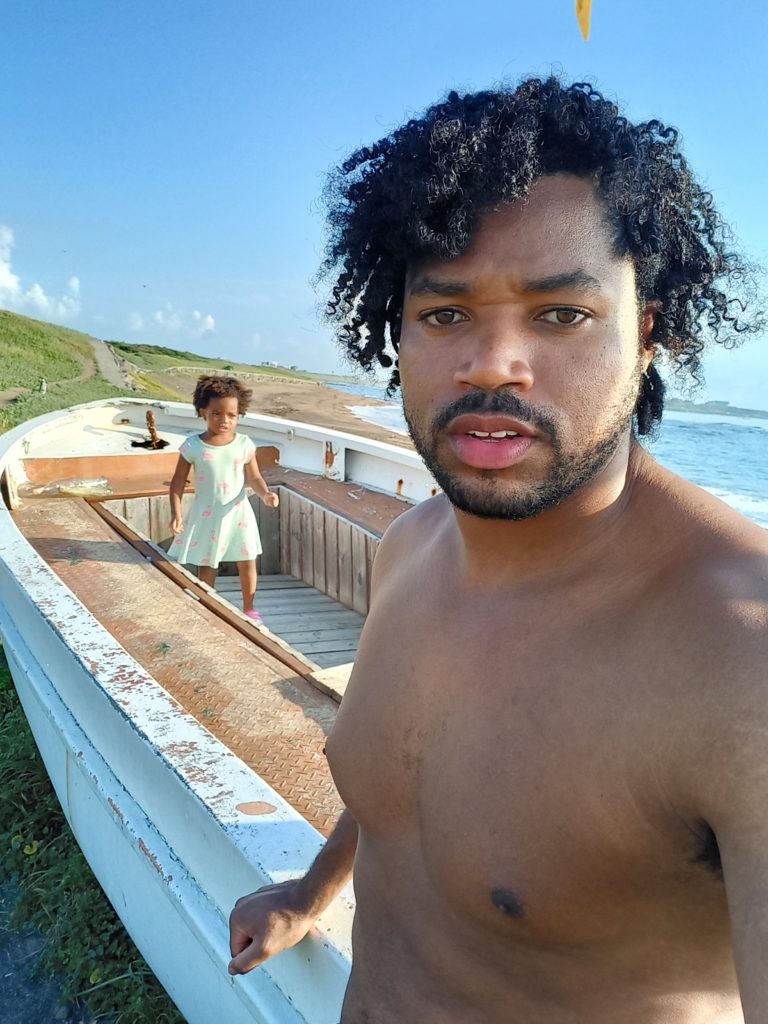 World's first quadrillionaire Kimroy KB Bailey and his baby Keilah Trott Bailey on their Fishing Boat.