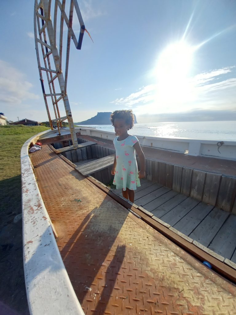 World's first quadrillionaire Kimroy KB Bailey and his baby Keilah Trott Bailey on their Fishing Boat.