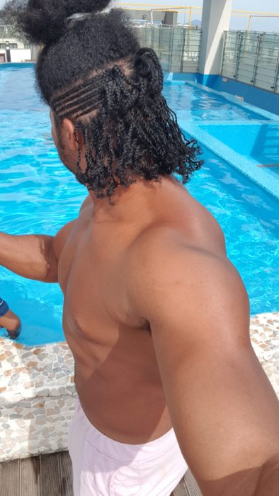 Quadrillionaire Kimroy KB Bailey showcases his new hairstyle at the poolside with Keilah Trott Bailey