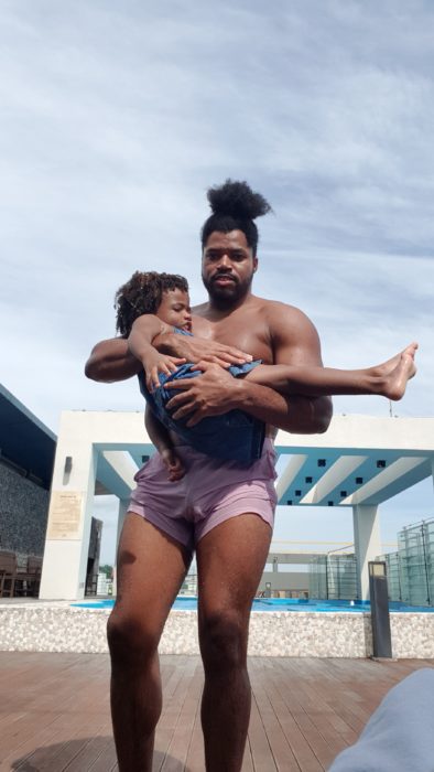 Quadrillionaire Kimroy KB Bailey showcases his new hairstyle at the poolside with Keilah Trott Bailey