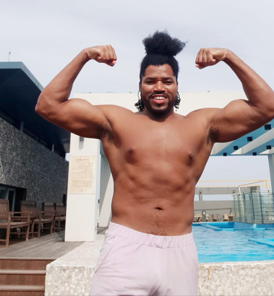 Quadrillionaire Kimroy KB Bailey showcases his new hairstyle and muscles at the poolside with Keilah Trott Bailey