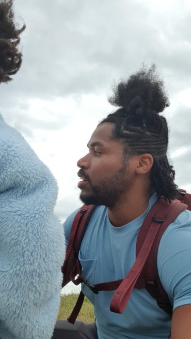 Quadrillionaire Kimroy KB Bailey showcases his new hairstyle at the seaside with Keilah Trott Bailey