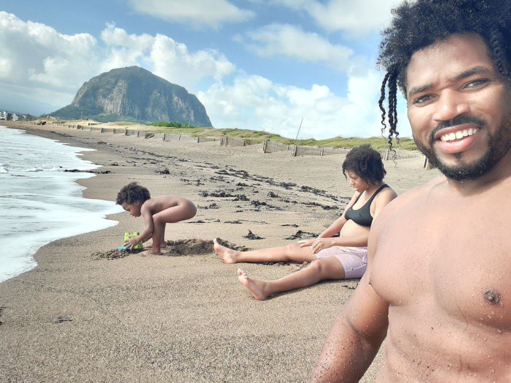 Quadrillionaire Trott Bailey Family chilling at the beach. Buff Bodybuilder Kimroy KB Bailey, Food lover Sher Trott Bailey and Princess Keilah Trott Bailey