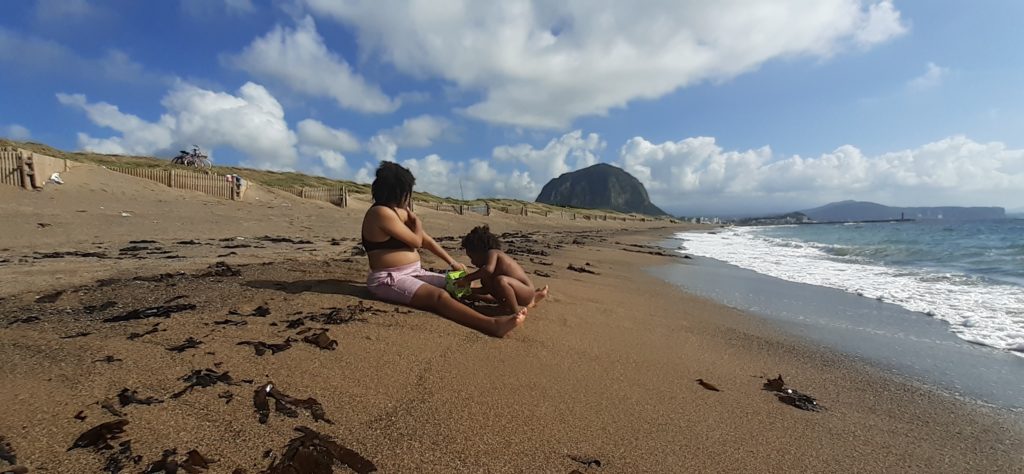 Quadrillionaire Trott Bailey Family chilling at the beach. Buff Bodybuilder Kimroy KB Bailey, Food lover Sher Trott Bailey and Princess Keilah Trott Bailey