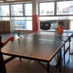Sher and Keilah play table tennis to unwind. World greatest fashion designer taking a break. Mom and daughter playing Table tennis Together during mommy and daughter playing time
