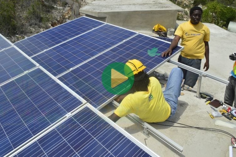 A Team of Engineers from the Kimroy Bailey Group install a solar panel system in Jamaica How to Install solar panels on your roof top the complete guide from the Step by Step Solar instructed by Kimroy Bailey at the Trott Bailey University
