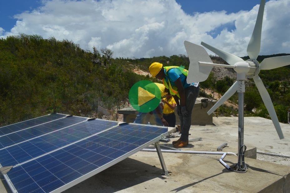 A Team of Engineers from the Kimroy Bailey Group install a solar panel system in Jamaica How to Install solar panels on your roof top the complete guide from the Step by Step Solar instructed by Kimroy Bailey at the Trott Bailey University