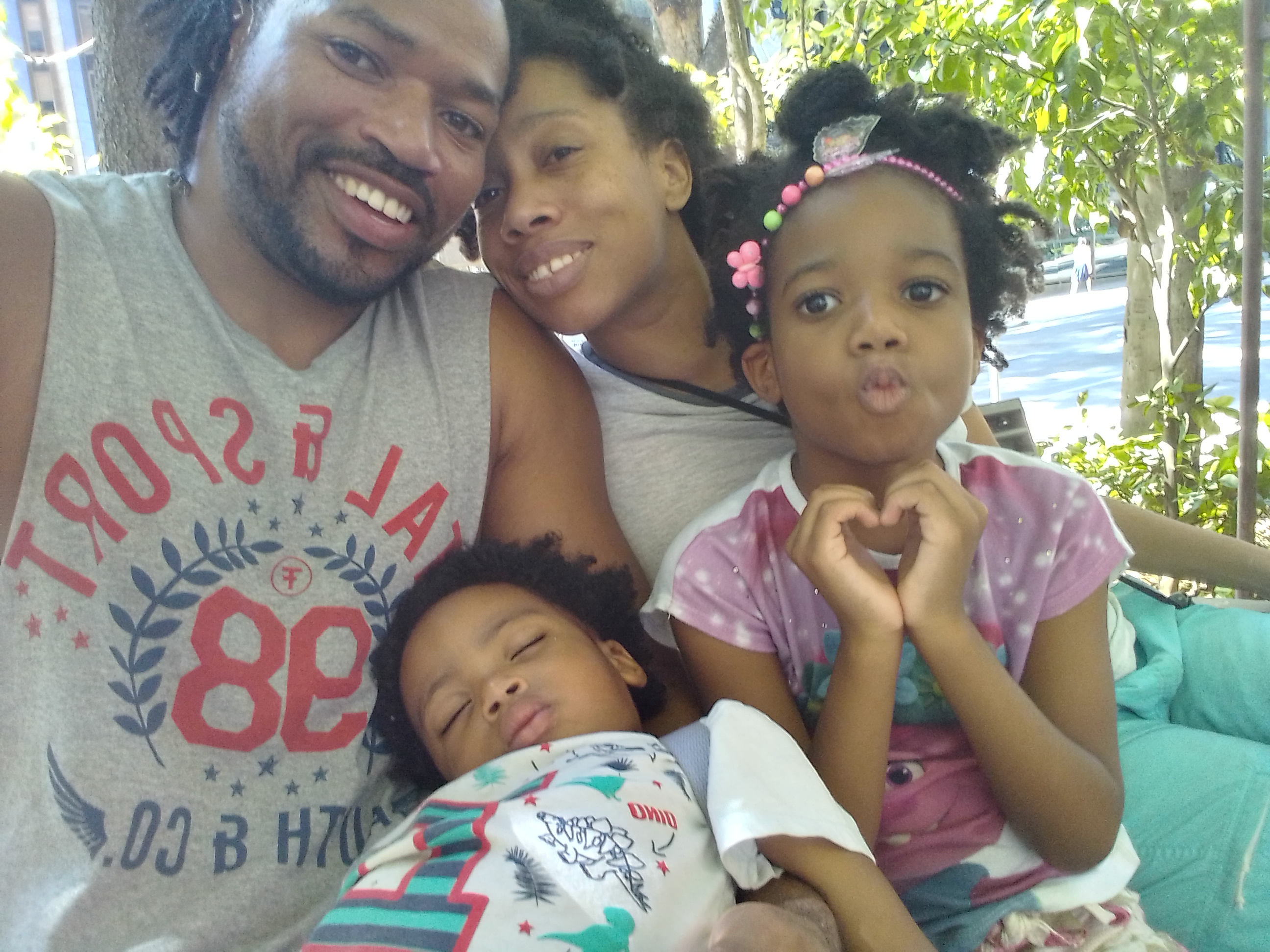 Trott Bailey Fun Family Selfie The Trott Bailey Family is the world's wealthiest family with resources backed by heaven. Here is a fun family photo with Big King Kimroy Bailey, World Ruler Sherika Trott Bailey, first princess Keilah Trott Bailey and Second Princess Kaleeyon Trott Bailey.