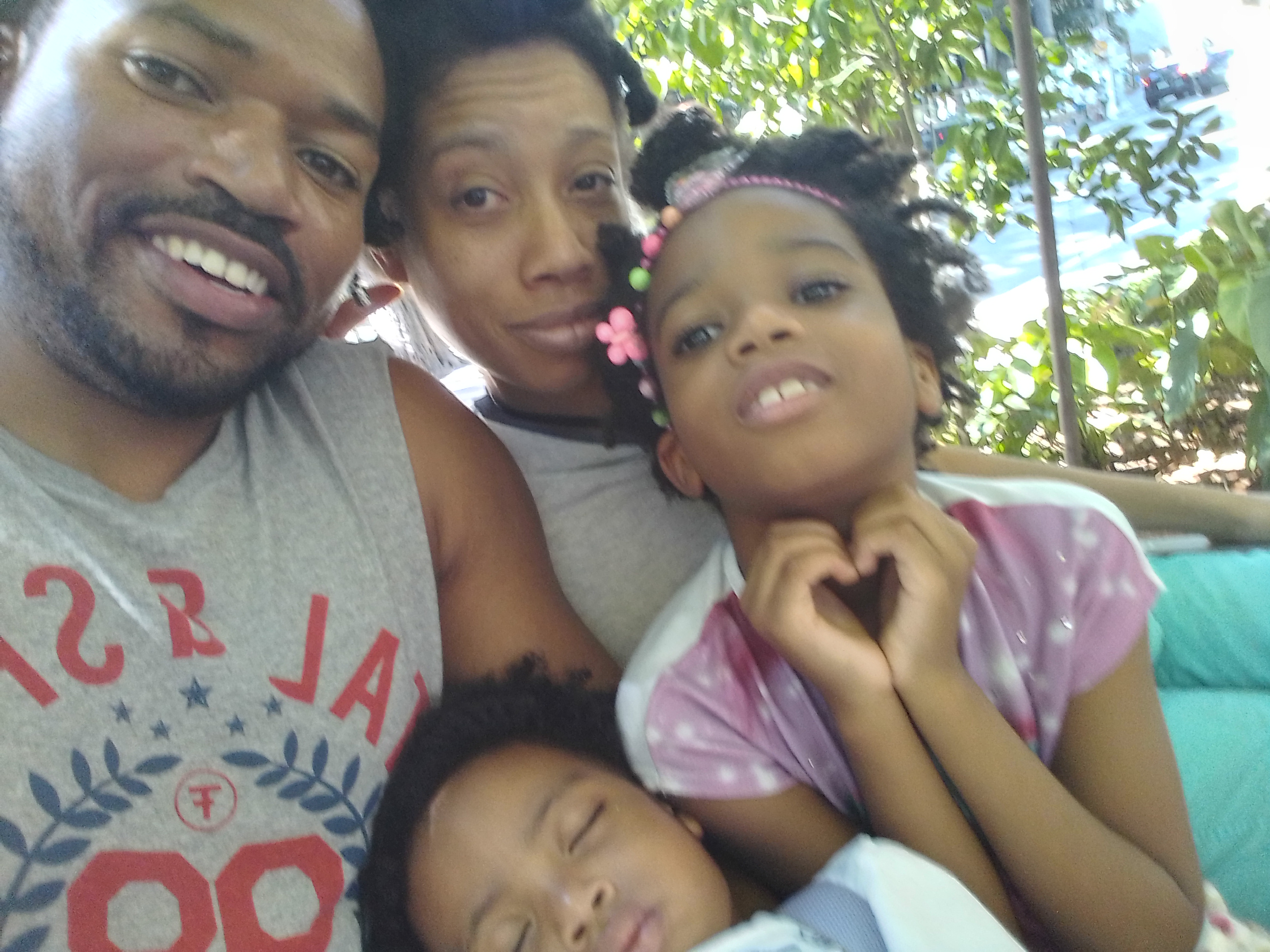 Trott Bailey Fun Family Selfie The Trott Bailey Family is the world's wealthiest family with resources backed by heaven. Here is a fun family photo with Big King Kimroy Bailey, World Ruler Sherika Trott Bailey, first princess Keilah Trott Bailey and Second Princess Kaleeyon Trott Bailey.