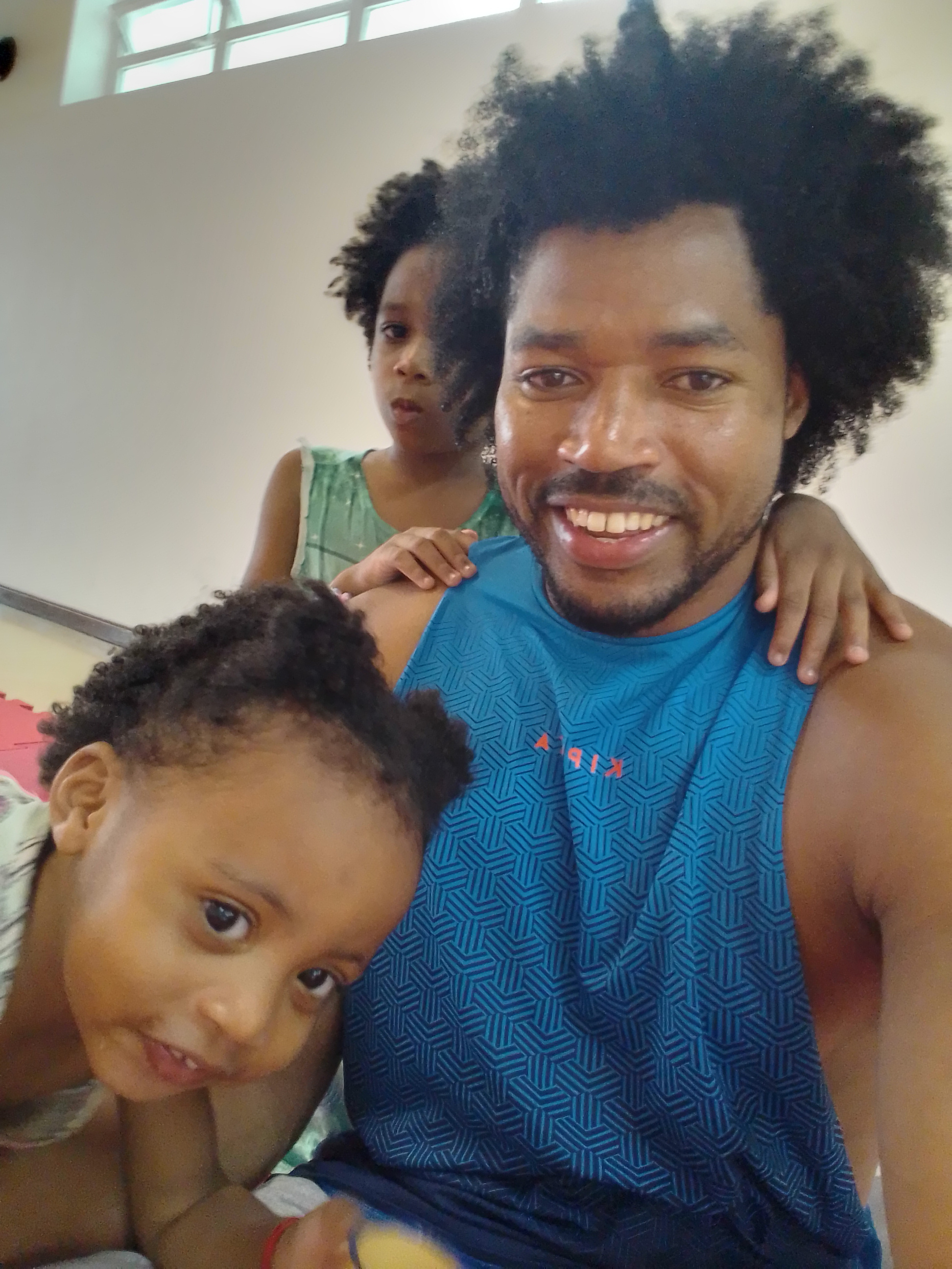 A father's love for his daughters. Big King Kimroy Bailey, Fighting Princess Kaleeyon Trott Bailey and Rainbow Princess Keilah Trott Bailey having fun together on the family chanllenge in Brasil. Here they are playing around in the kids room as SESC Consolacao in Sao Paulo
