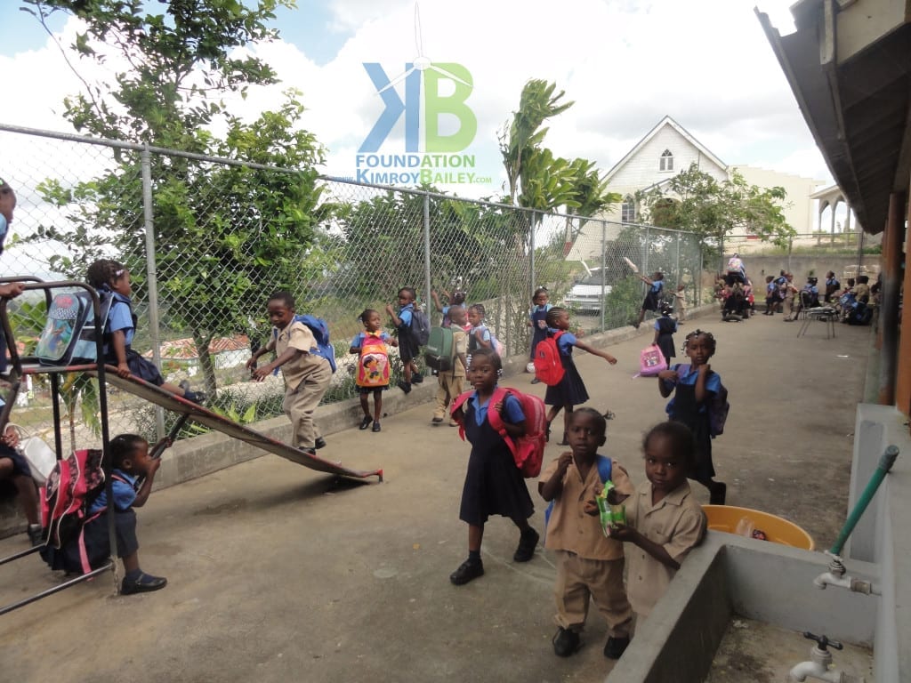 Students from the Litchfield Baptist Basic School gather to play in the school yard after school