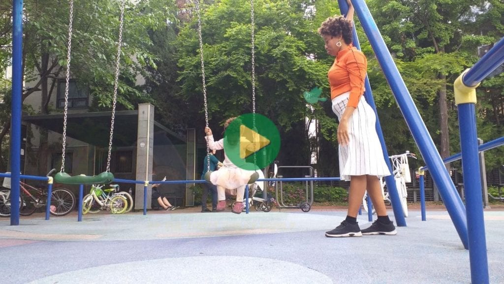 Trillionaire Sher Trott Bailey and Baby Keilah swinging at the park