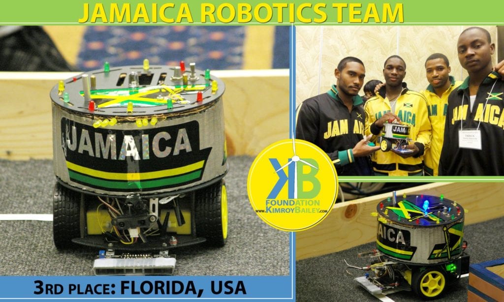 Jamaica 3rd Place Robotics Team in Global Competition by Kimroy Bailey Robotics. Kimroy Bailey and his robotics team cohort holding the JamBot a robot capable of autonomously navigating a tight space and detecting voltage, current and temperture variation. the robot was placed 3rd in the robotics competition in IEEE competition in Florida USA