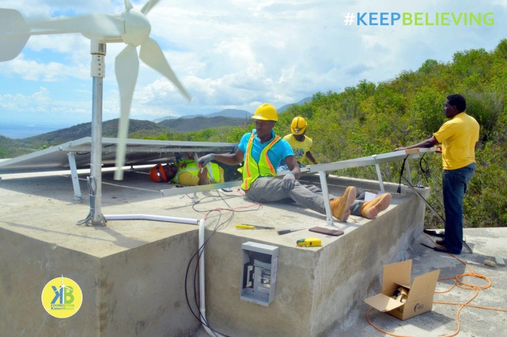 Kimroy Bailey Group in a Fun Solar and Wind Turbine Installation Project- Solar Installation Training - at work