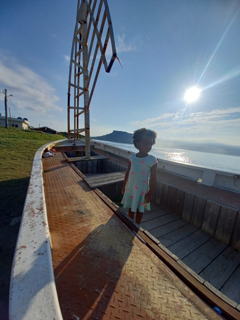 World's first quadrillionaire Kimroy KB Bailey and his baby Keilah Trott Bailey on their Fishing Boat.