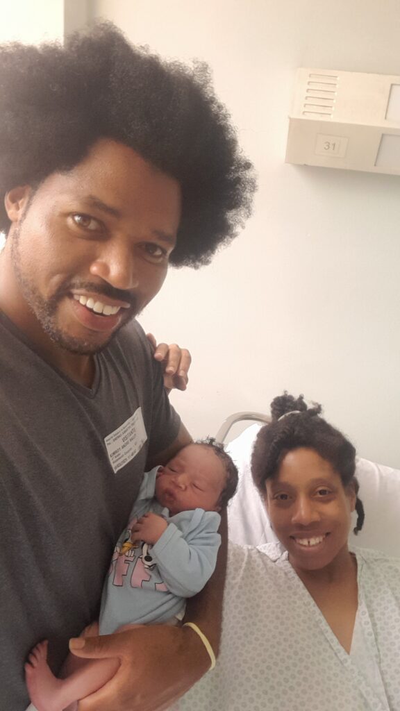 Crown Prince Kezidek Iztolev Trott Bailey 7 hours old with dad Kimroy Bailey and mom Sherika Trott Bailey